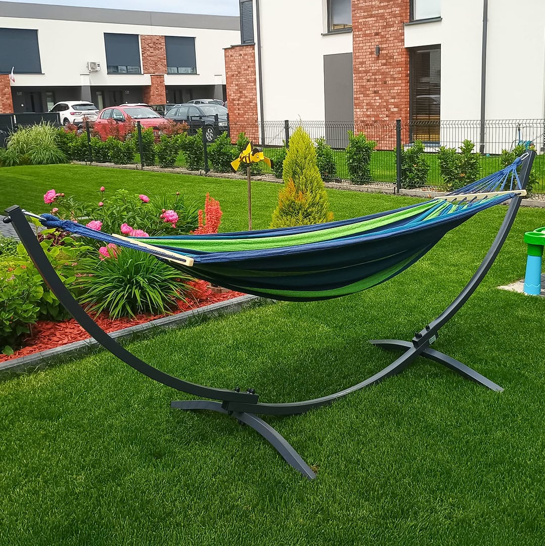 Hammock with stand in garden viewed from the side