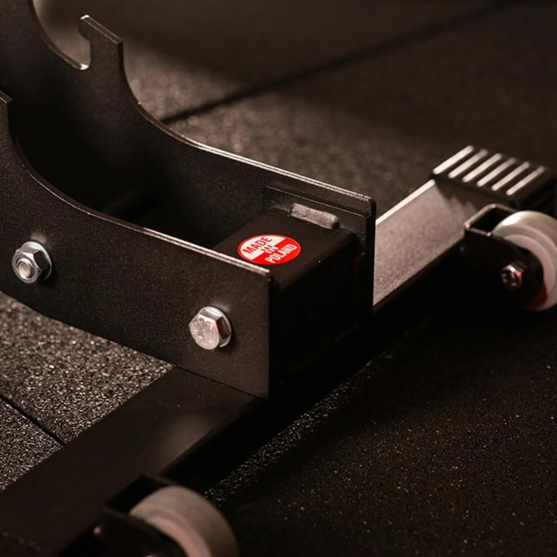 Close up of steel incline adjustment rail on gym bench