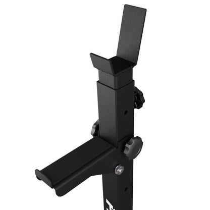 Detail view of K-Sport squat rack's adjustable barbell holder and safety catch