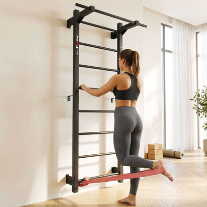 Woman training with a resistance band on K-Sport wall bars at home