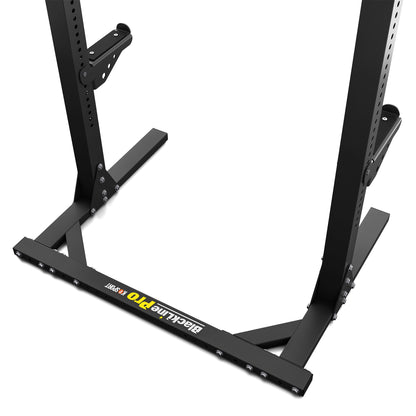 Close-up of adjustable barbell holders on heavy-duty squat rack for safe strength training