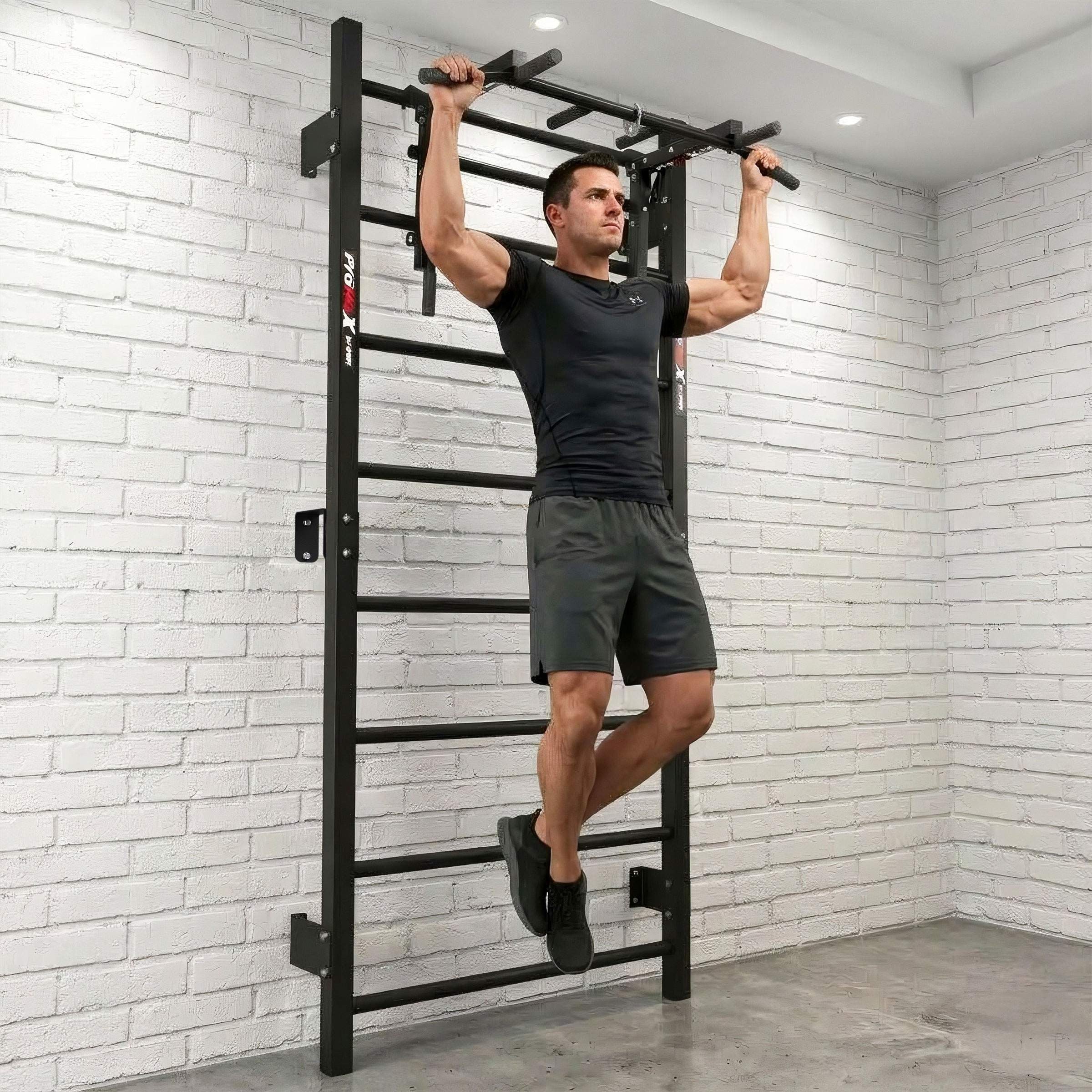 Man doing pull-ups on the K-Sport Swedish ladder wall bars at home