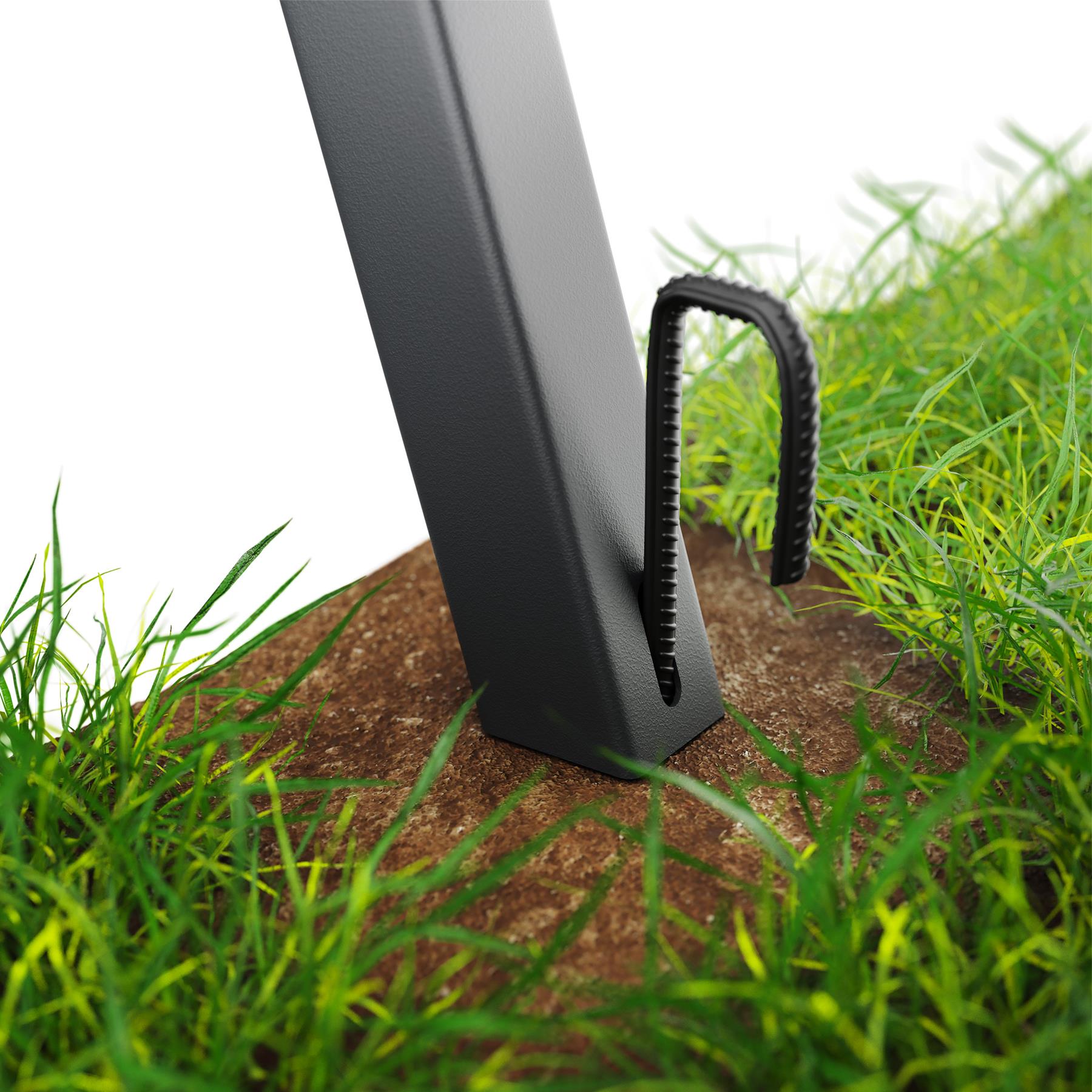Close-up of ground anchor securing outdoor frame into soil