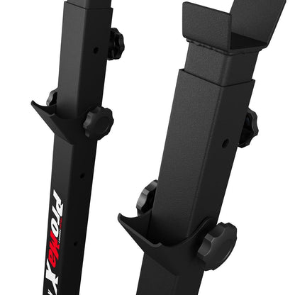 Close-up of the adjustable hooks and knobs on the K-Sport weight rack system